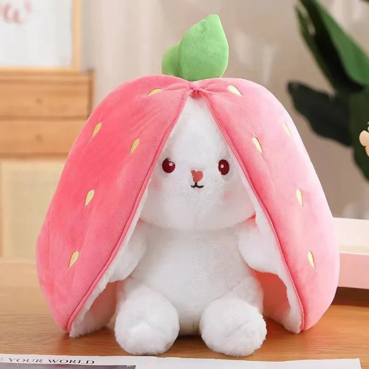 Cute strawberry bunny plush doll on white background